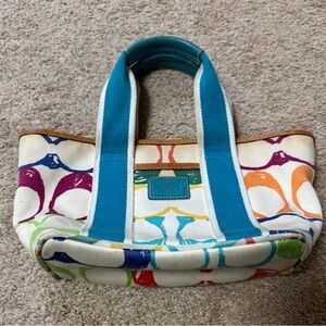 COACH Canvas Tote Bag with Teal Handles and Multicolor Print